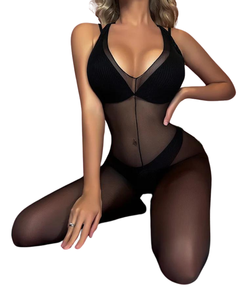 Woman wearing black crotchless nylon bodystocking, seductive bodysuit.